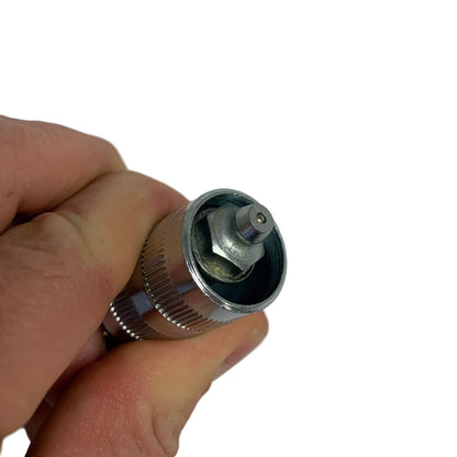 LockNLube® New Zealand 90° Grease Coupler Adapter front image in hand