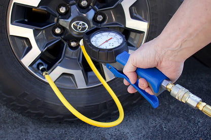 Product demonstration of tyre inflator on car tyre.