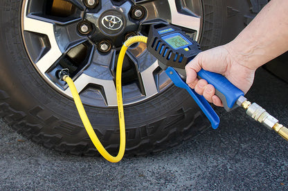Image showing  real demonstration of digital tire inflator to inflate a car tire.