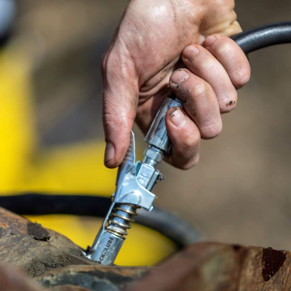 LockNLube New Zealand Grease Coupler usage in real world environment, in real situations
